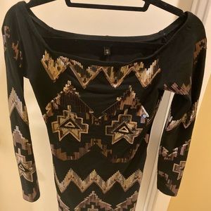 Slightly worn black sequined dress